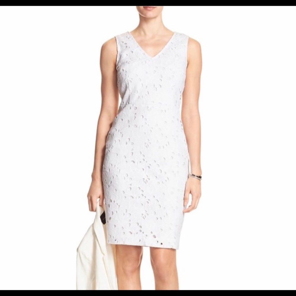 White sleeveless lace dress.